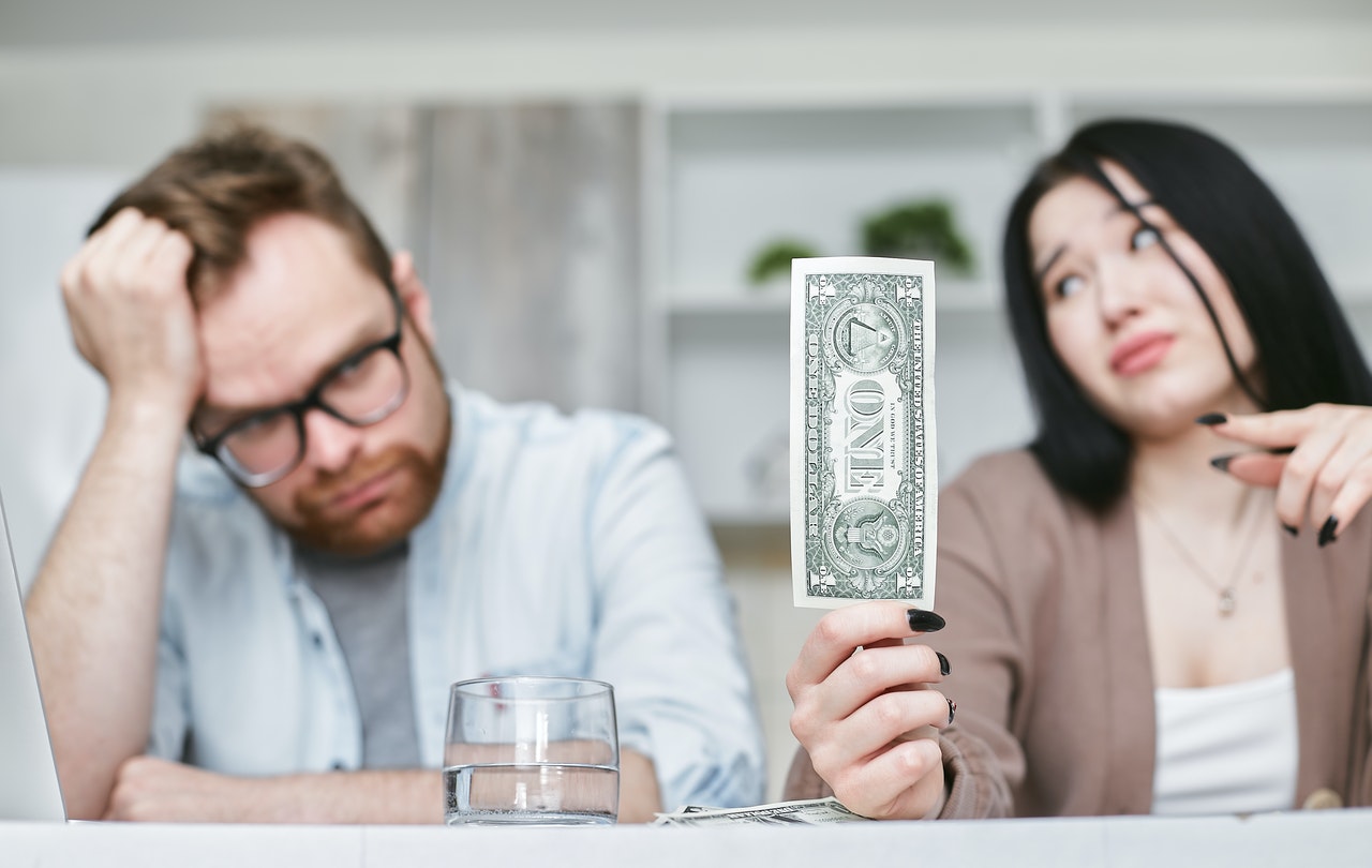 Couple with one dollar